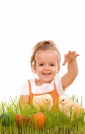 simsearch:400-04621574,k - Happy laughing little girl with spring chicks and easter eggs in the grass - isolated Stock Photo - Budget Royalty-Free & Subscription, Code: 400-04806029