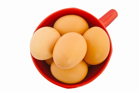simsearch:400-04313912,k - brown eggs in red bowl on white background Stockbilder - Microstock & Abonnement, Bildnummer: 400-04806141