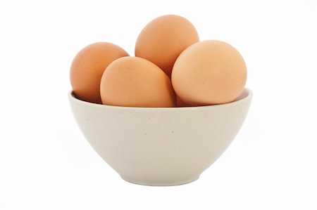 simsearch:400-04313912,k - brown eggs in tan bowl on white background Stockbilder - Microstock & Abonnement, Bildnummer: 400-04806142