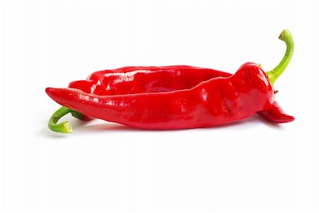 paprika in water - fresh red hot pepper on a white Stock Photo - Budget Royalty-Free & Subscription, Code: 400-04806479