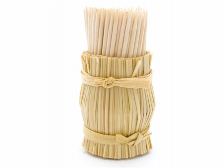 It is a lot of toothpicks with a glass from straw which it is isolated on a white background Stockbilder - Microstock & Abonnement, Bildnummer: 400-04806648
