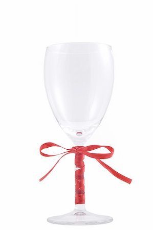 simsearch:400-05286682,k - glass of wine and red ribbon over white background Stock Photo - Budget Royalty-Free & Subscription, Code: 400-04806679