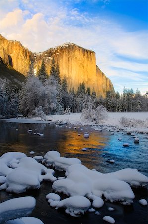 View of beautiful Yosemite valley in winter with the Merced river and snow covered El Capitan at sunset Foto de stock - Super Valor sin royalties y Suscripción, Código: 400-04806801