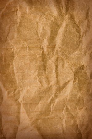 sheet of paper wrinkled - copy-space, texture of cardboard crumpled brown paper Stock Photo - Budget Royalty-Free & Subscription, Code: 400-04806835