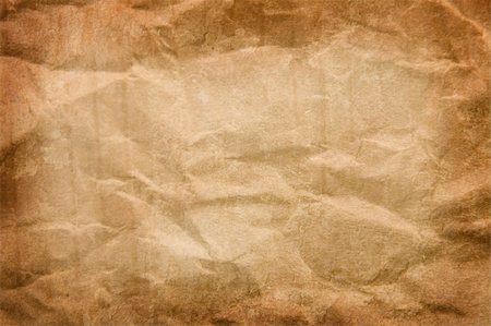 sheet of paper wrinkled - copy-space, texture of cardboard crumpled brown paper Stock Photo - Budget Royalty-Free & Subscription, Code: 400-04806837