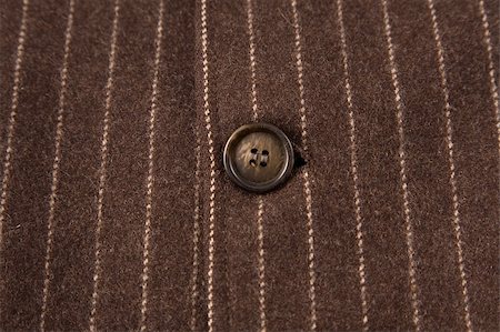 front view of classic striped fabric with close-up of brown button Stock Photo - Budget Royalty-Free & Subscription, Code: 400-04806868