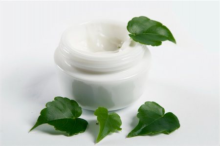 skincare leaf - front view of cosmetic cream with green leaves Stock Photo - Budget Royalty-Free & Subscription, Code: 400-04806936