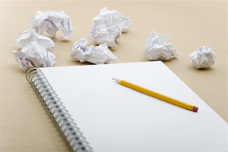 simsearch:400-06074044,k - crumpled paper and crushed yellow pencil on notebook Stock Photo - Budget Royalty-Free & Subscription, Code: 400-04806948