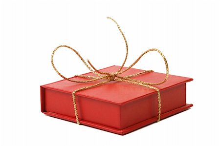 simsearch:400-03956490,k - red present box with golden shiny ribbon white background Stockbilder - Microstock & Abonnement, Bildnummer: 400-04806950