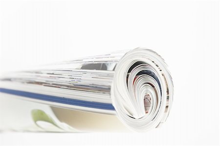 simsearch:400-05901369,k - closeup of Magazine Roll isolated on white Stock Photo - Budget Royalty-Free & Subscription, Code: 400-04806966