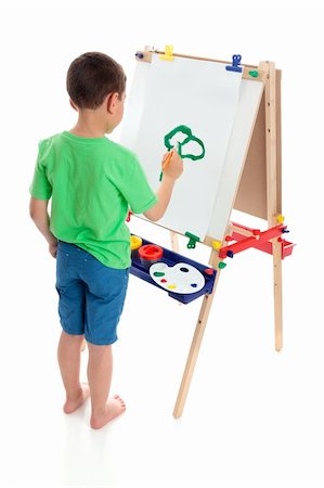 school boy in shorts - A young boy painting a picture on an art easel.  White background. Stock Photo - Budget Royalty-Free & Subscription, Code: 400-04807354