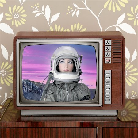 pink science - space odyssey mars astronaut on retro 60s tv moon discovery metaphor Stock Photo - Budget Royalty-Free & Subscription, Code: 400-04807442