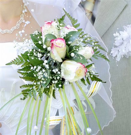 Beautiful white wedding bouquet in hands of the bride. Stock Photo - Budget Royalty-Free & Subscription, Code: 400-04807566