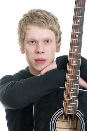 photos of boys lips - young handsome guy with a guitar. isolated on white Stock Photo - Budget Royalty-Free & Subscription, Code: 400-04807912