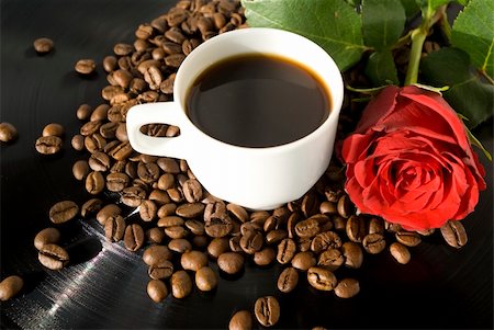 cup with coffee on grains of coffee with rose Stock Photo - Budget Royalty-Free & Subscription, Code: 400-04808200