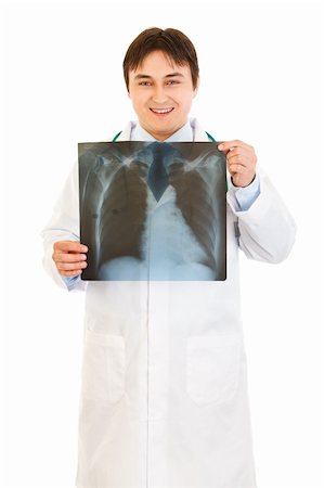 simsearch:400-04508758,k - Smiling medical doctor holding thorax  x-ray in hands isolated on white Foto de stock - Super Valor sin royalties y Suscripción, Código: 400-04808273
