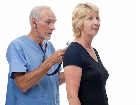 An elderly woman is having a male doctor or nurse check her heartbeat with his stethoscope. Isolated on white background. Photographie de stock - Aubaine LD & Abonnement, Code: 400-04808872