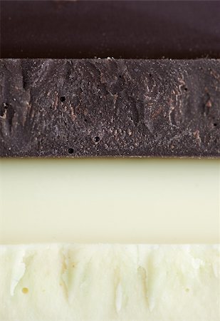 simsearch:400-05149272,k - Stack of Black, Brown and White Chocolate isolated on white background Stock Photo - Budget Royalty-Free & Subscription, Code: 400-04809687