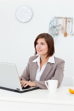 simsearch:400-04341796,k - Businesswoman thinking about something in her kitchen Stockbilder - Microstock & Abonnement, Bildnummer: 400-04800926