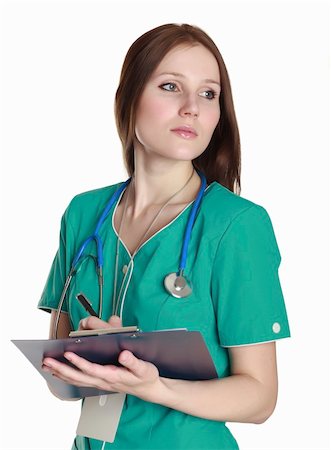 simsearch:400-04508758,k - Female doctor wearing green uniform and holding a clipboard with medical paperwork. Foto de stock - Super Valor sin royalties y Suscripción, Código: 400-04801308