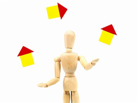 simsearch:400-04801462,k - A wooden mannequin juggling houses isolated against a white background Stock Photo - Budget Royalty-Free & Subscription, Code: 400-04801485