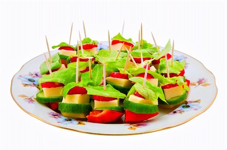 Canape on a dish on a white background Stock Photo - Budget Royalty-Free & Subscription, Code: 400-04801621