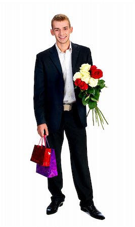 Young Man With Rose and shopping bag  isolated on white Stock Photo - Budget Royalty-Free & Subscription, Code: 400-04802005