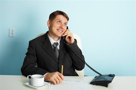 simsearch:400-03989090,k - Business man talking on the phone in the office Fotografie stock - Microstock e Abbonamento, Codice: 400-04802070