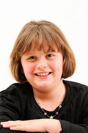 young beautiful  short brown hair teenager smiling with dimple in cheek Stockbilder - Microstock & Abonnement, Bildnummer: 400-04803058