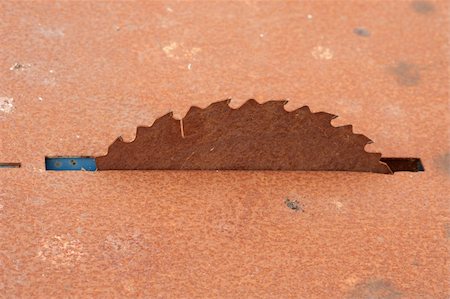 rusty tools - Old circular saw blade on rusty work bench Stock Photo - Budget Royalty-Free & Subscription, Code: 400-04803231