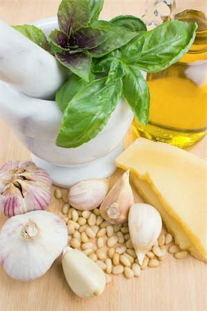 Basic ingredients for cooking Italian basil pesto sauce close-up Fotografie stock - Microstock e Abbonamento, Codice: 400-04803329