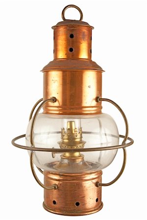 Old brass lantern with petroluem light Fotografie stock - Microstock e Abbonamento, Codice: 400-04803330