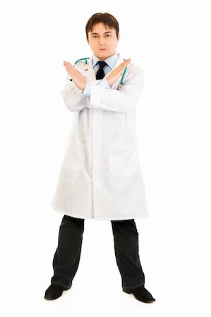 simsearch:400-07334526,k - Serious medical doctor with crossed arms isolated on white. Forbidden gesture. Stock Photo - Budget Royalty-Free & Subscription, Code: 400-04803463