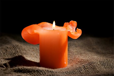 Closeup of a burning candle on the dark background Stock Photo - Budget Royalty-Free & Subscription, Code: 400-04803476