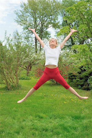 Young woman  jumping Stock Photo - Budget Royalty-Free & Subscription, Code: 400-04803504