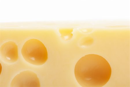 Macro view of piece of cheese Stock Photo - Budget Royalty-Free & Subscription, Code: 400-04803718