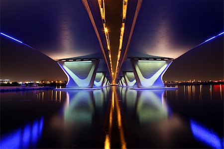 The Al Garhoud Bridge in Dubai crosses the Creek and is illuminated at night Stock Photo - Budget Royalty-Free & Subscription, Code: 400-04803939