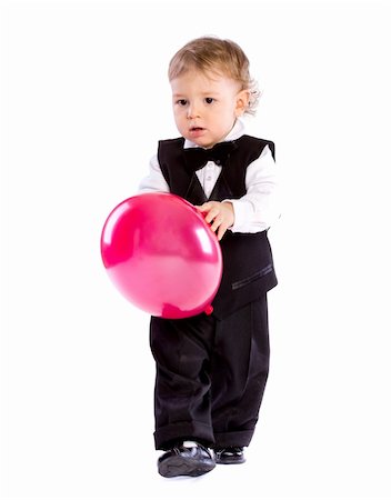 Baby boy in age one year holding balloon isolated Fotografie stock - Microstock e Abbonamento, Codice: 400-04803976