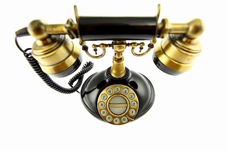 simsearch:400-03986450,k - Old fashioned telephone isolated on white background Photographie de stock - Aubaine LD & Abonnement, Code: 400-04814969