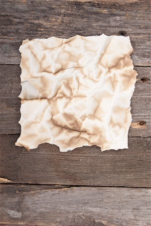 scrolled up paper - Old paper on wood texture Stock Photo - Budget Royalty-Free & Subscription, Code: 400-04815553
