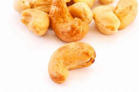 simsearch:400-08695656,k - Cashew is isolated on a white background Foto de stock - Super Valor sin royalties y Suscripción, Código: 400-04815728