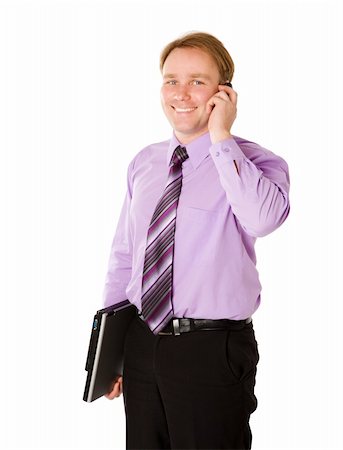 simsearch:400-04199603,k - Businessman talking on cell phone holding laptop isolated Stock Photo - Budget Royalty-Free & Subscription, Code: 400-04815758