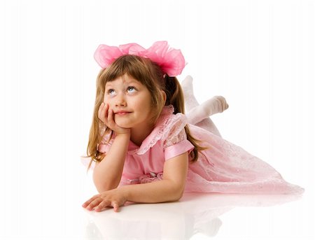 Happy girl wearing pink dress isolated on white Stockbilder - Microstock & Abonnement, Bildnummer: 400-04815772