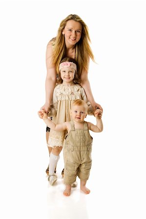 simsearch:400-04195162,k - Mother and two children smiling isolated on white Foto de stock - Super Valor sin royalties y Suscripción, Código: 400-04815809