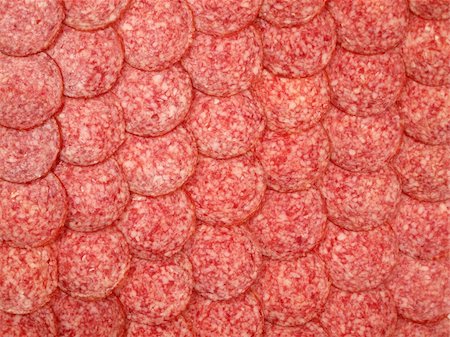sizovin (artist) - Background of smoked sausage cut into thin slices Photographie de stock - Aubaine LD & Abonnement, Code: 400-04816247