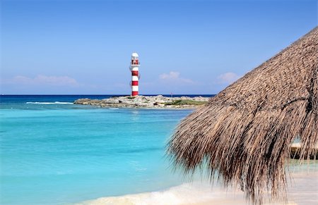 Cancun lighthouse in turquoise caribbean beach Photographie de stock - Aubaine LD & Abonnement, Code: 400-04816263