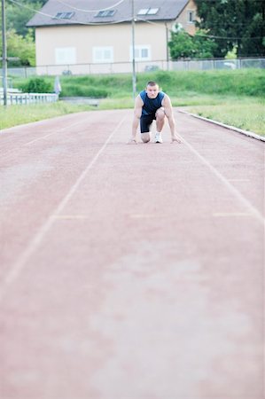 healthy young man at start line ready for run race and win Stock Photo - Budget Royalty-Free & Subscription, Code: 400-04816882