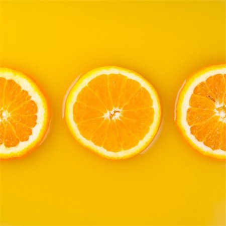 simsearch:400-05148141,k - pieces of orange in orange juice Stockbilder - Microstock & Abonnement, Bildnummer: 400-04817292