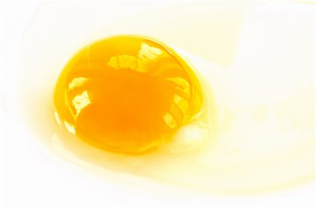 shapes of baking products - yolk from broken eggs photographed on a light background Stock Photo - Budget Royalty-Free & Subscription, Code: 400-04818389