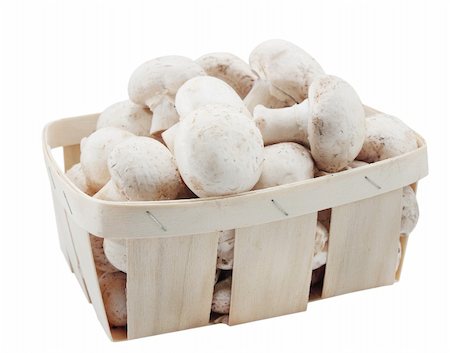 simsearch:400-07430898,k - Basket with the agarics on the white Photographie de stock - Aubaine LD & Abonnement, Code: 400-04818400